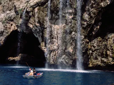 There is an a little cave at exit of harbour. It's called Hijacker Cave.