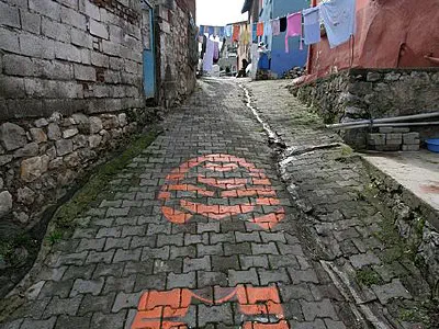 An artwork from a Gölyazi street, a giant step