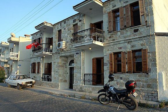 Foça - A stone house in the street