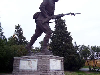 Sculpture outside the cemetary. There is a Turkish folksong lyric on the base of sculpture.