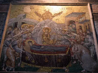 Koimesis, the Dormition of the Virgin. Before ascending to Heaven, her last sleep. Jesus is holding an infant, symbol of Mary's soul. Over the entrance from the Narthex.
