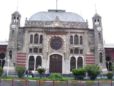Orient Restaurant and Clock Towers on both side.