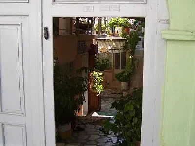 Look to a courtyard through the door.