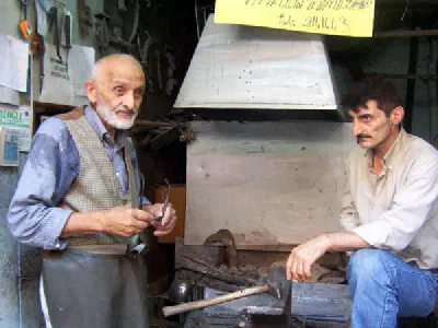 An old ironworker and his son
